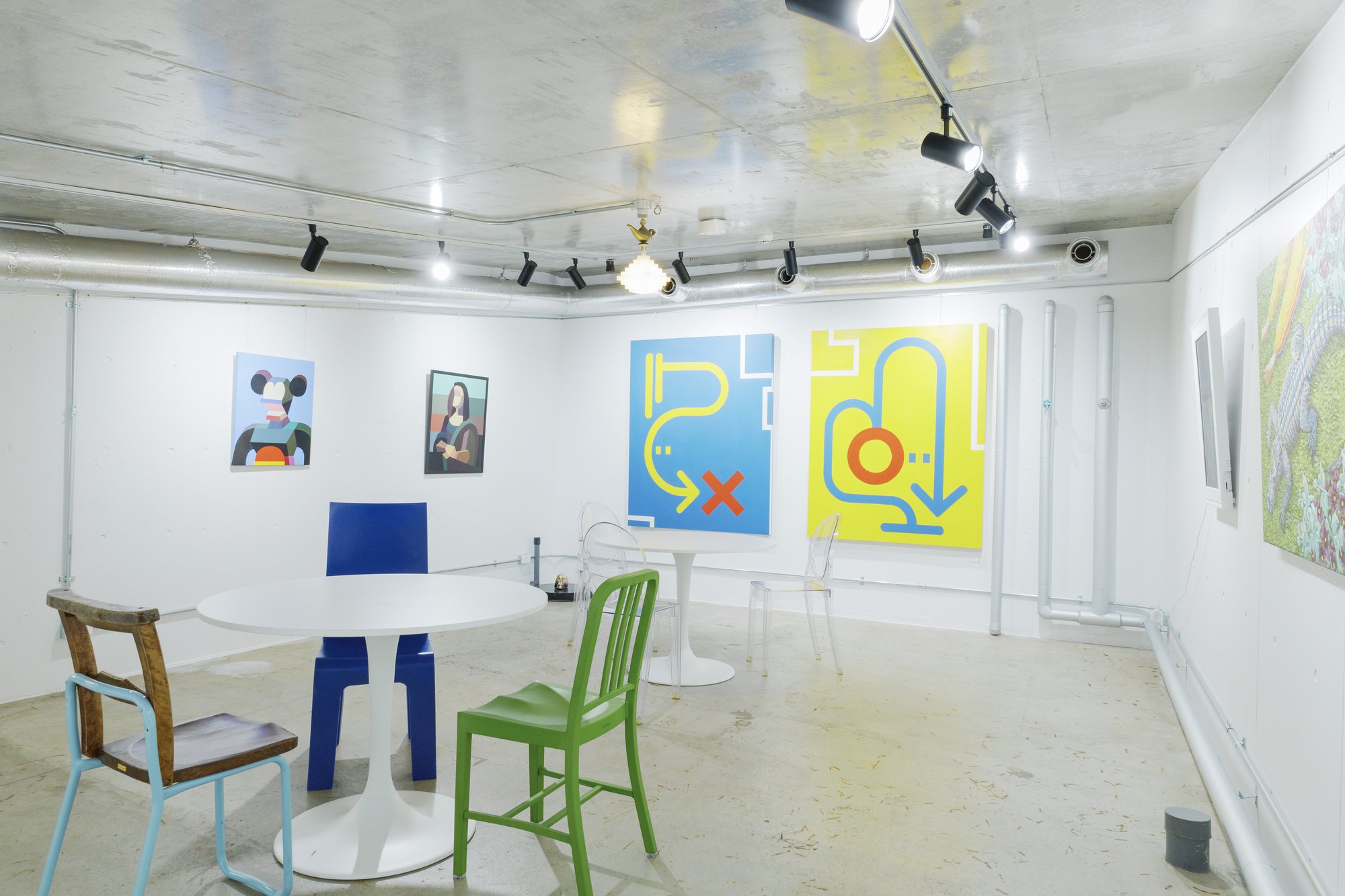 The lounge at AFRODE CLINIC, hung with contemporary art, Omotesando Tokyo