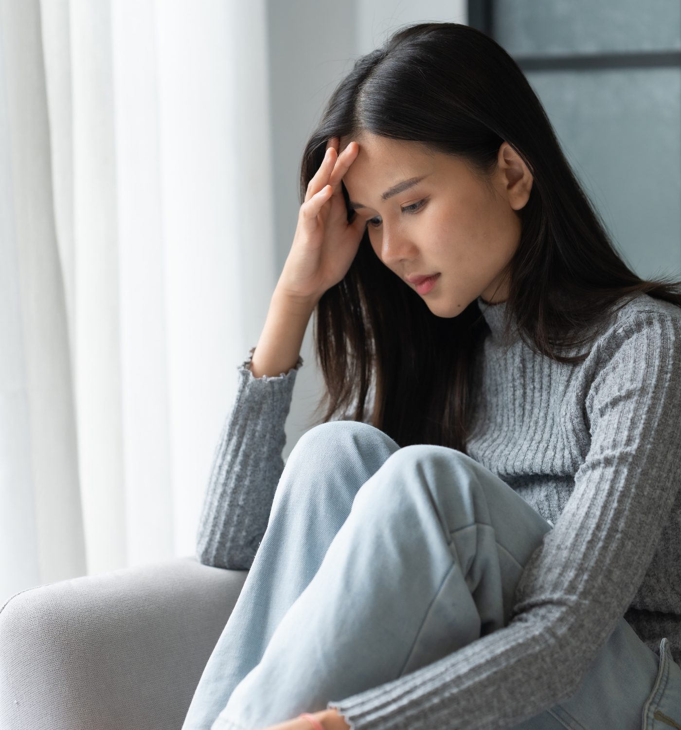 疲れを感じている女性